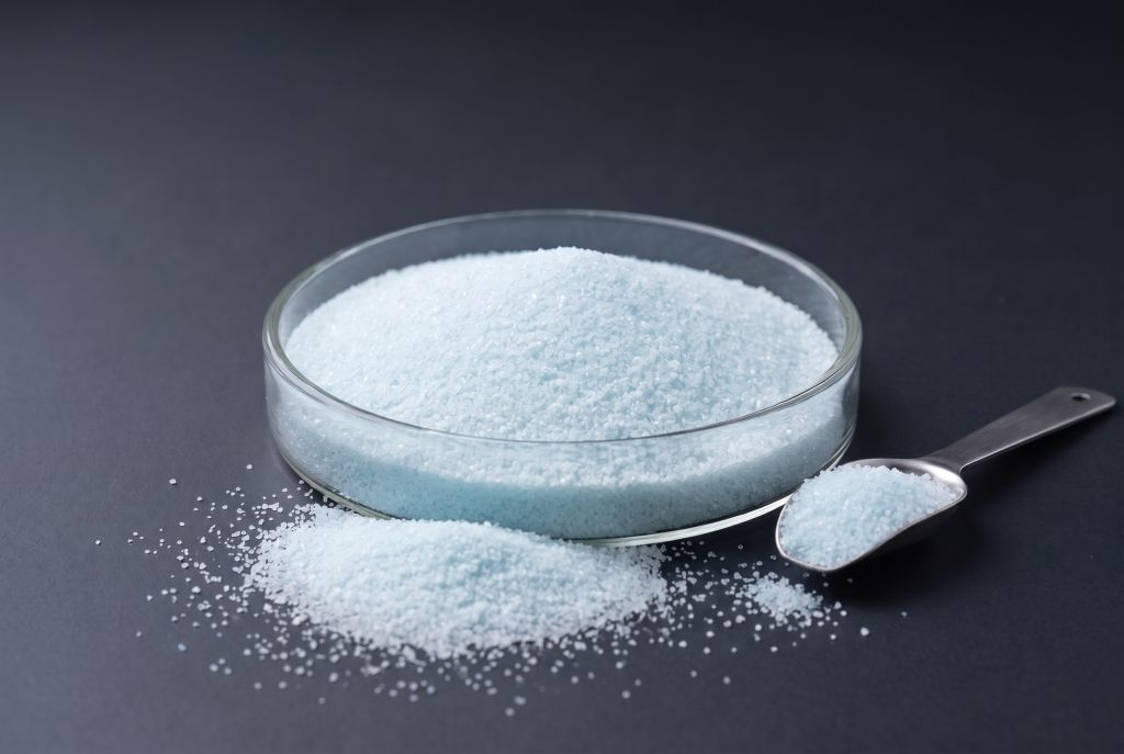 Glow granules (up to 1 mm) in a glass dish, blue, in daylight
