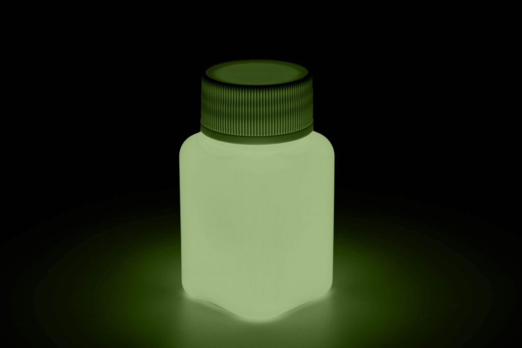 Glow paint in a jar, orange, glowing in the dark
